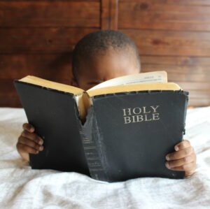 Child reading the Bible
